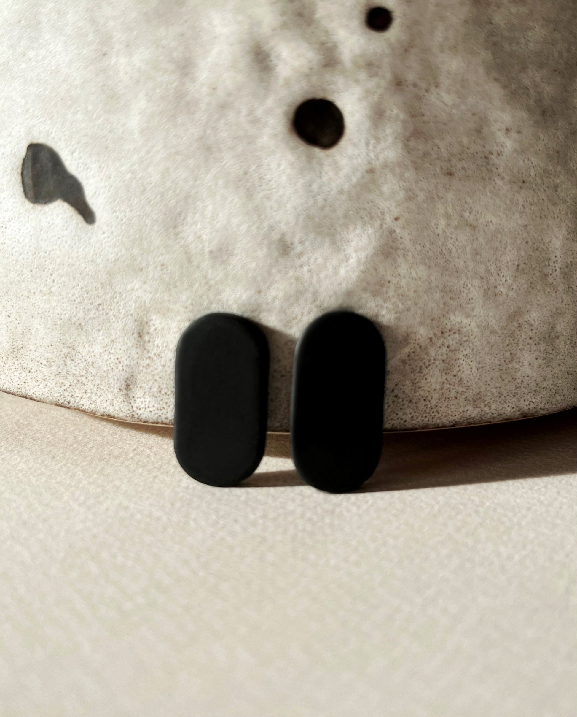 Minimalist Matte Black Rectangle Stud Earrings handmade from polymer clay.